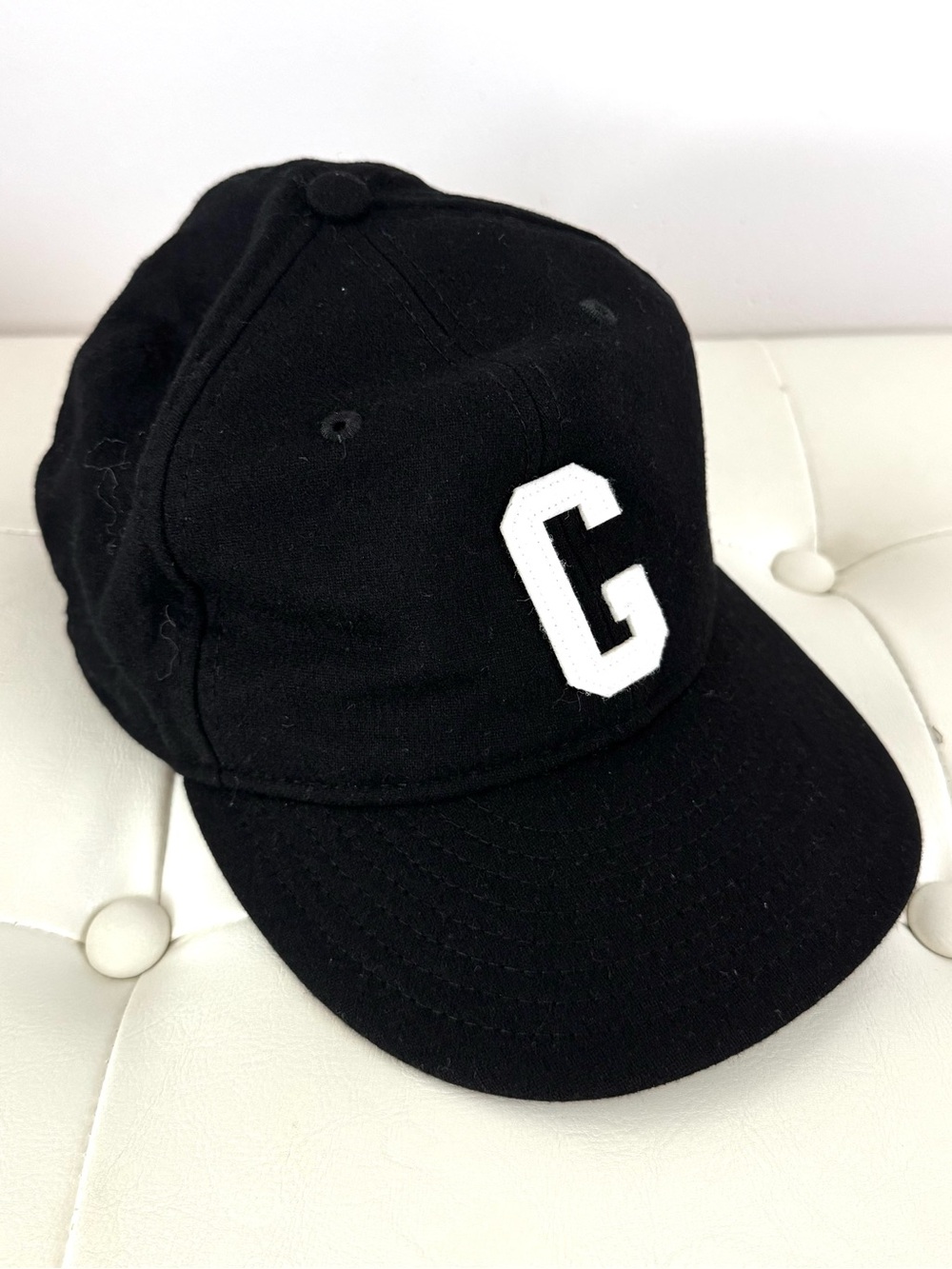 Fear of God Essentials Black Cap with White 'G' Letter